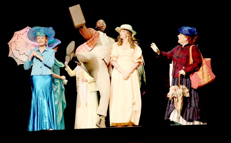 See this scene from “Hello, Dolly!” and cast members (L-R) Hannah Carey, Rendarris Gaines as “Ambrose Kemper,” Lana Stelter as “Ermengarde” and Lisa Walker as “Mrs. Dolly Gallagher-Levi,”  on The Elbert Theatre stage Friday, April 21 through Sunday, April 23 and Friday, April 28 through Sunday, April 30.  (Photo by Scoggins) 