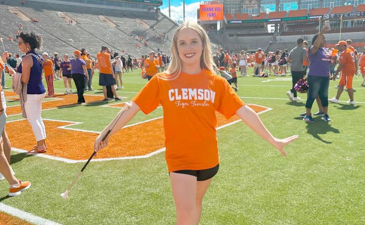 Elbert County Comprhehensive High School senior and Elbert County Blue Devil Marching Band feature twirler Lyndsie Acker is one of the newest majorettes for the Clemson University Tigers. Acker submitted an audition video for Clemson in March and received an invitation to live auditions held on the Clemson campus on April 15.  She auditioned in competition with twirlers from all over the country and was selected as 1 of the 10 Tiger Twirlers that will perform with the Tiger Band this Fall.  