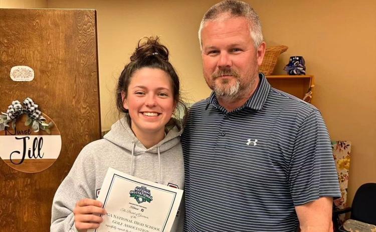 Senior golfer Abby Byrant (right), pictured with Head Golf Coach Larry Kesler, has been selected to by the National High School Golf Association to compete in the Girls National High School Golf Invitational for the second year in a row. The event will take place July 10-12 at the Omni Professional Golf Association Frisco Resort in Frisco, Texas.