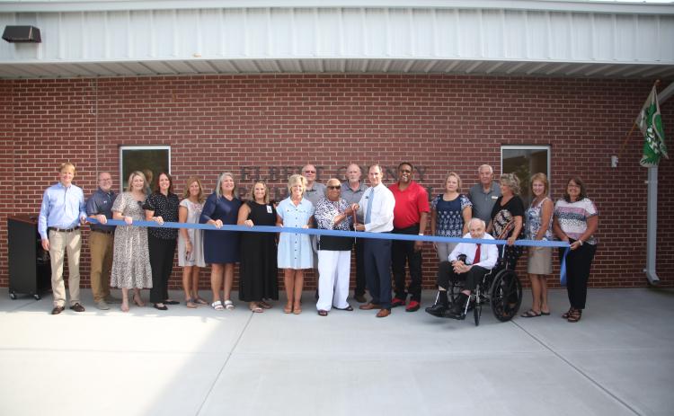 Pictured during the July 19 ribbon cutting at Elbert County Primary School are (front row, L-R) Josh Atkinson of Carroll Daniel Construction, Jon Jarvis, Amanda Lucas, Rebecca Long, Haley Oakley, Susan Fortson, Hannah Williams, Christy Hart, Theresa Barnett, Robert Wheeler, Kam McClary, Heather Nestor, Phillip Hart, Pamela Eaves, Patricia Graham and Bridgette Matthews and (back row, L-R) Keith Harper, Mike Turner and David Hunt. (Photo by Wells)