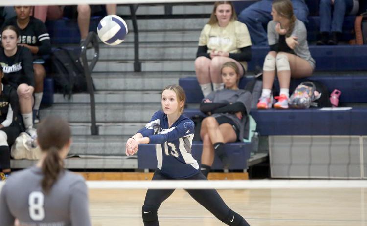 Ryleigh Stowers bumps the ball during Elbert County’s 2-0 loss to Prince Avenue Sept. 7. The Lady Devils went on to defeat Commerce 2-1 later in the evening. (Photo by Wells)