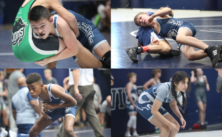 Above left, Matthew Douglas performs a double-leg takedown on a Franklin County wrestler. Above right,Keith Moon tries to turn his opponent as he sets up a pin. Below left, Jaydence Jones stares down his opponent after the start of his match. Below right, Yilany Medina-Medellin looks for a takedown opportunity. (Photos by Wells)