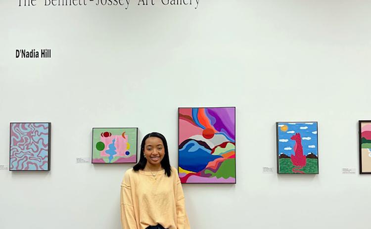 Senior D'Nadia Hill's artwork headlines the newest installation of the Bennett-Jossey Art Gallery in the media center at Elbert County Comprehensive High School. 
